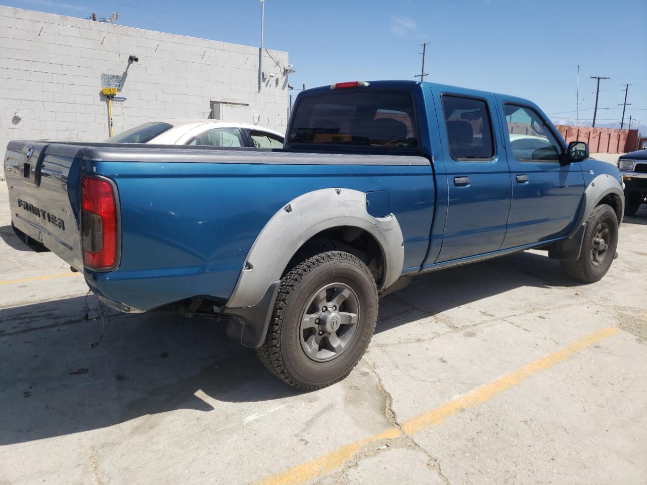 Photo 4 from auction – 2003 NISSAN FRONTIER C with VIN 1N6ED29X03C410559