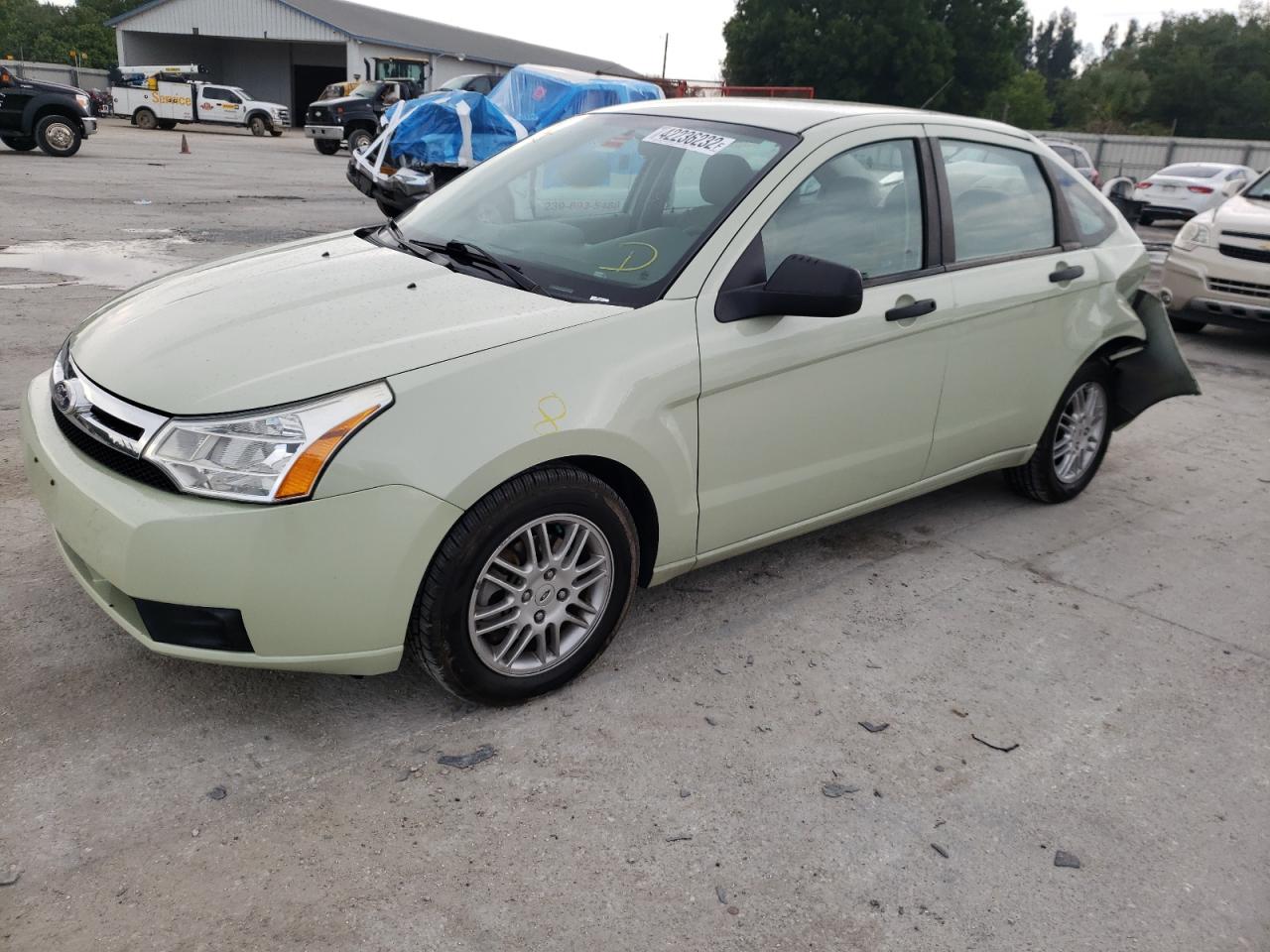 Photo 2 from auction – 2011 FORD FOCUS SE with VIN 1FAHP3FN9BW172259