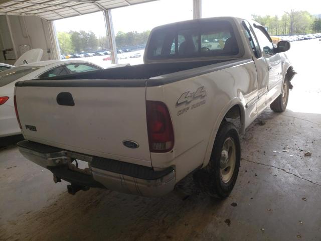 Photo 4 from auction – 1998 FORD F150 with VIN 1FTRX18L0WNA20929