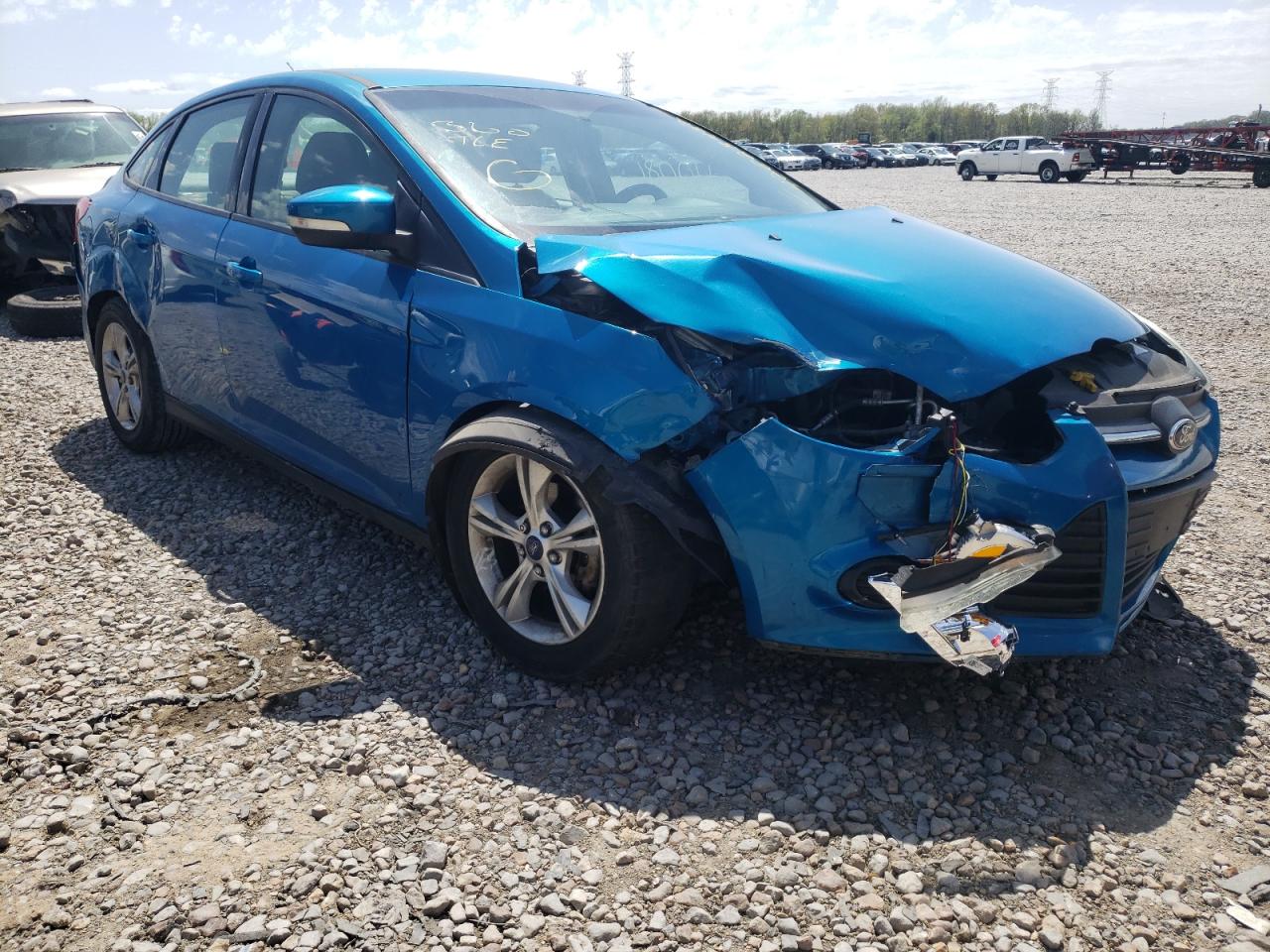 FORD FOCUS SE 2014 with VIN 1FADP3F28EL126710 - Photo from auction