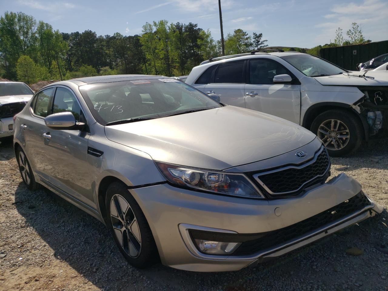 KIA OPTIMA HYB 2012 with VIN KNAGM4ADXC5027643 - Photo from auction