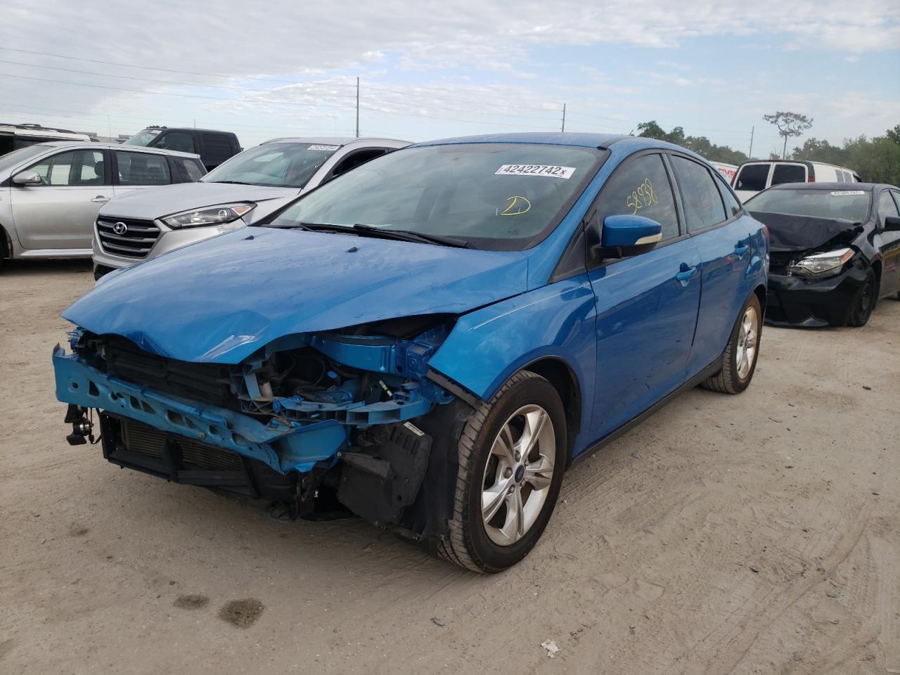 Photo 2 from auction – 2014 FORD FOCUS SE with VIN 1FADP3F28EL345876
