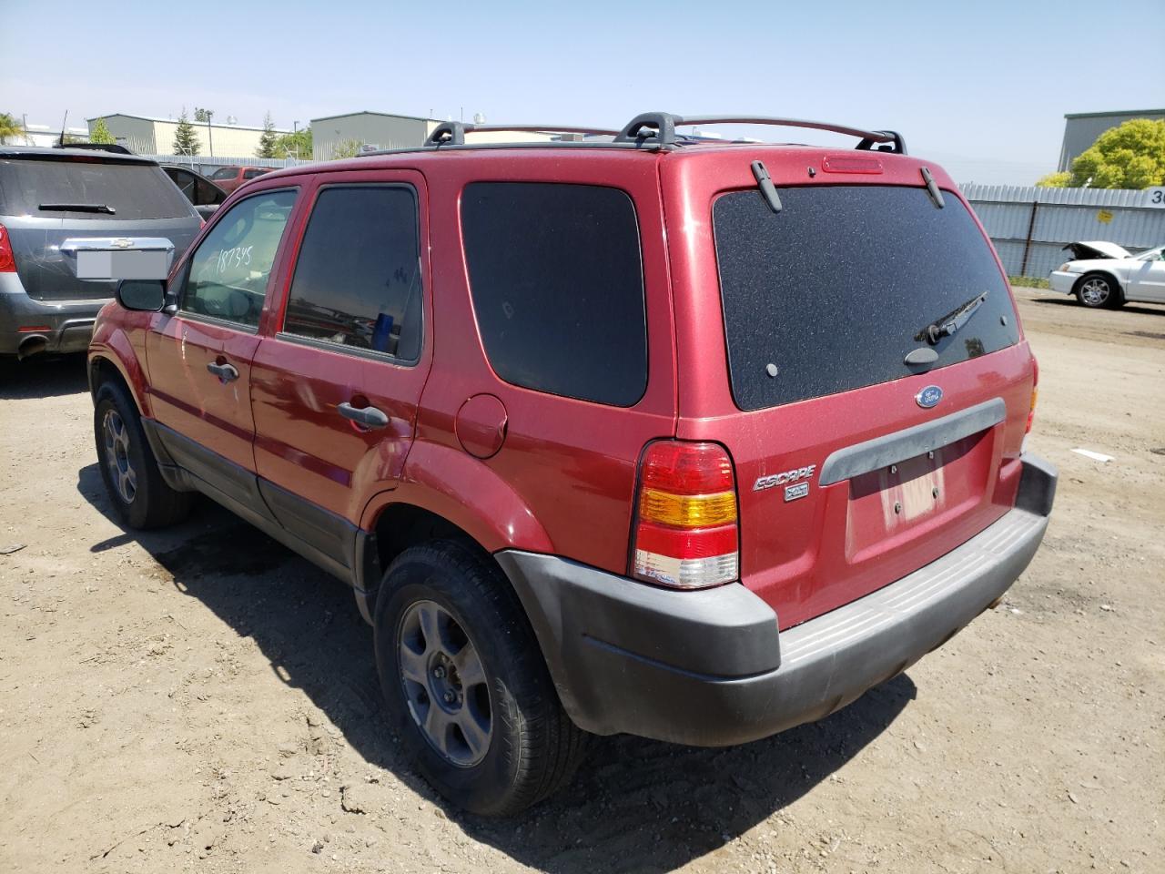 Photo 3 from auction – 2003 FORD ESCAPE XLT with VIN 1FMYU93123KC66706