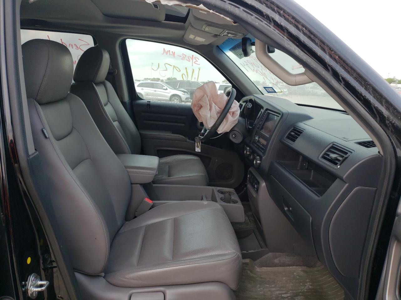 Photo 5 from auction – 2011 HONDA RIDGELINE with VIN 5FPYK1F59BB001634