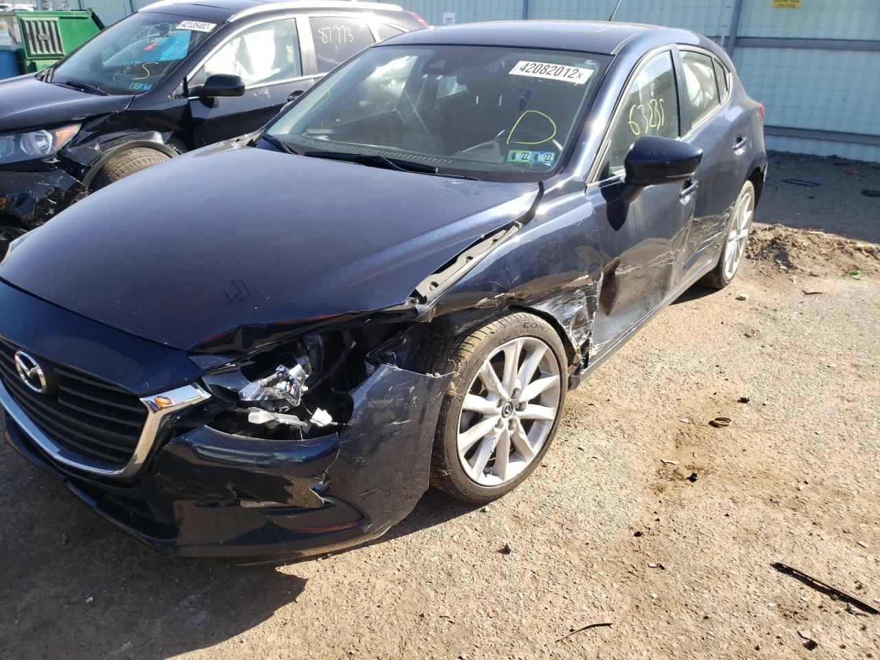 Photo 9 from auction – 2017 MAZDA 3 TOURING with VIN JM1BN1L33H1127885