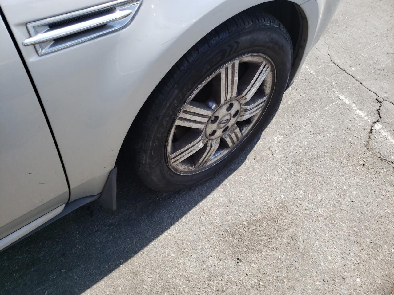 Photo 9 from auction – 2009 FORD TAURUS LIM with VIN 1FAHP25W09G118518