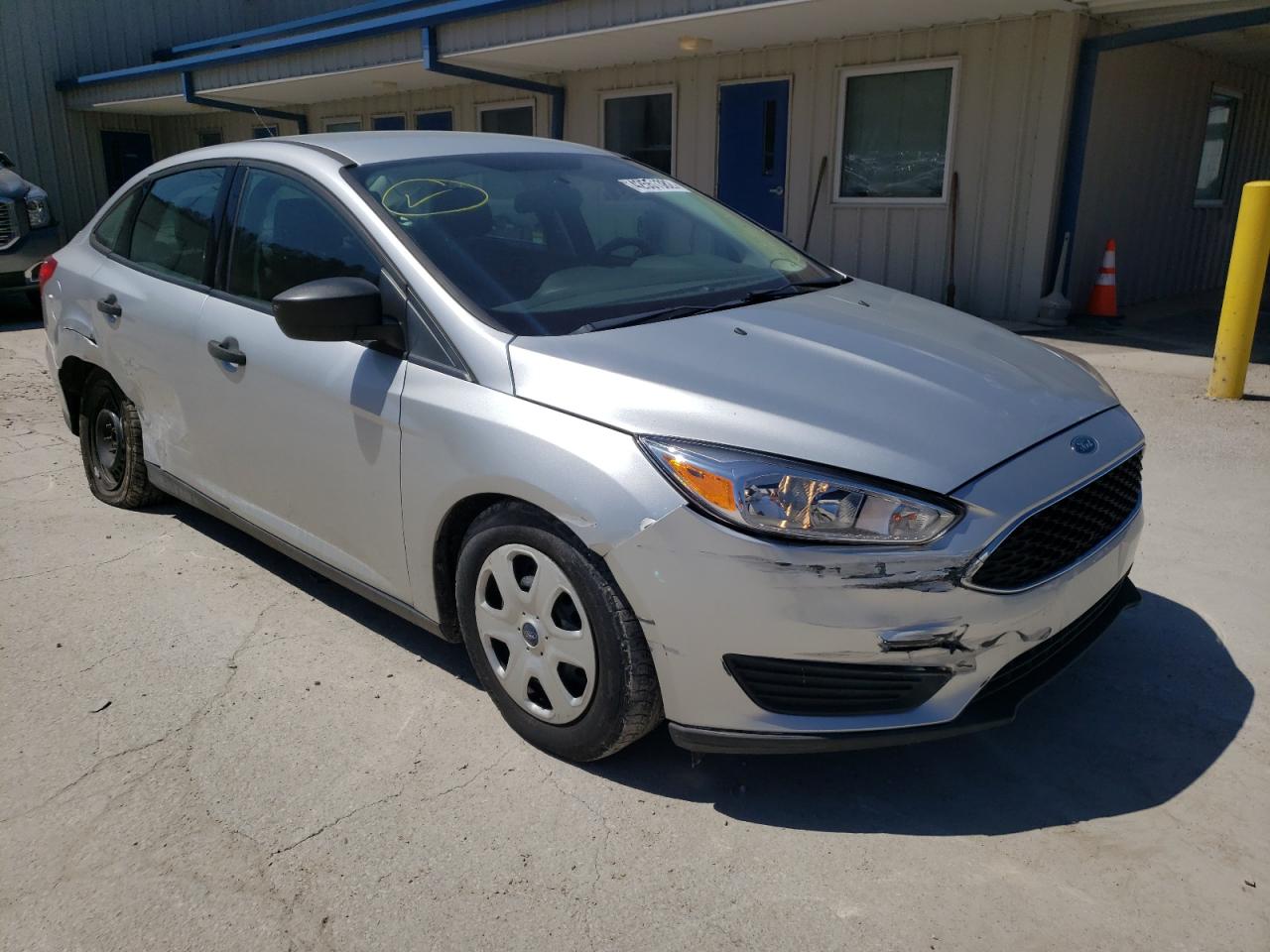 FORD FOCUS 2015 with VIN 1FADP3E20FL247864 - Photo from auction