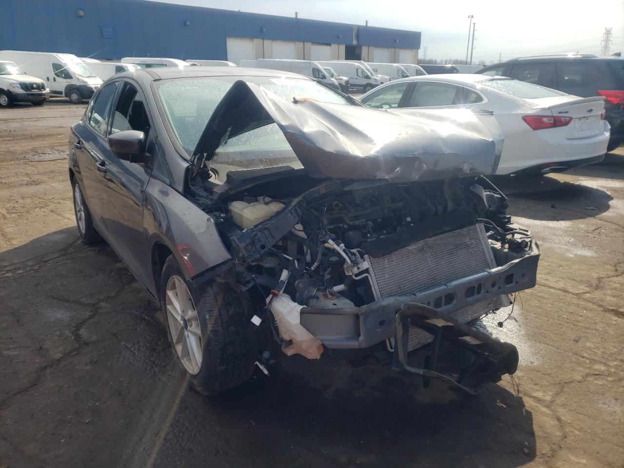 FORD FOCUS SE 2018 with VIN 1FADP3F2XJL229010 - Photo from auction