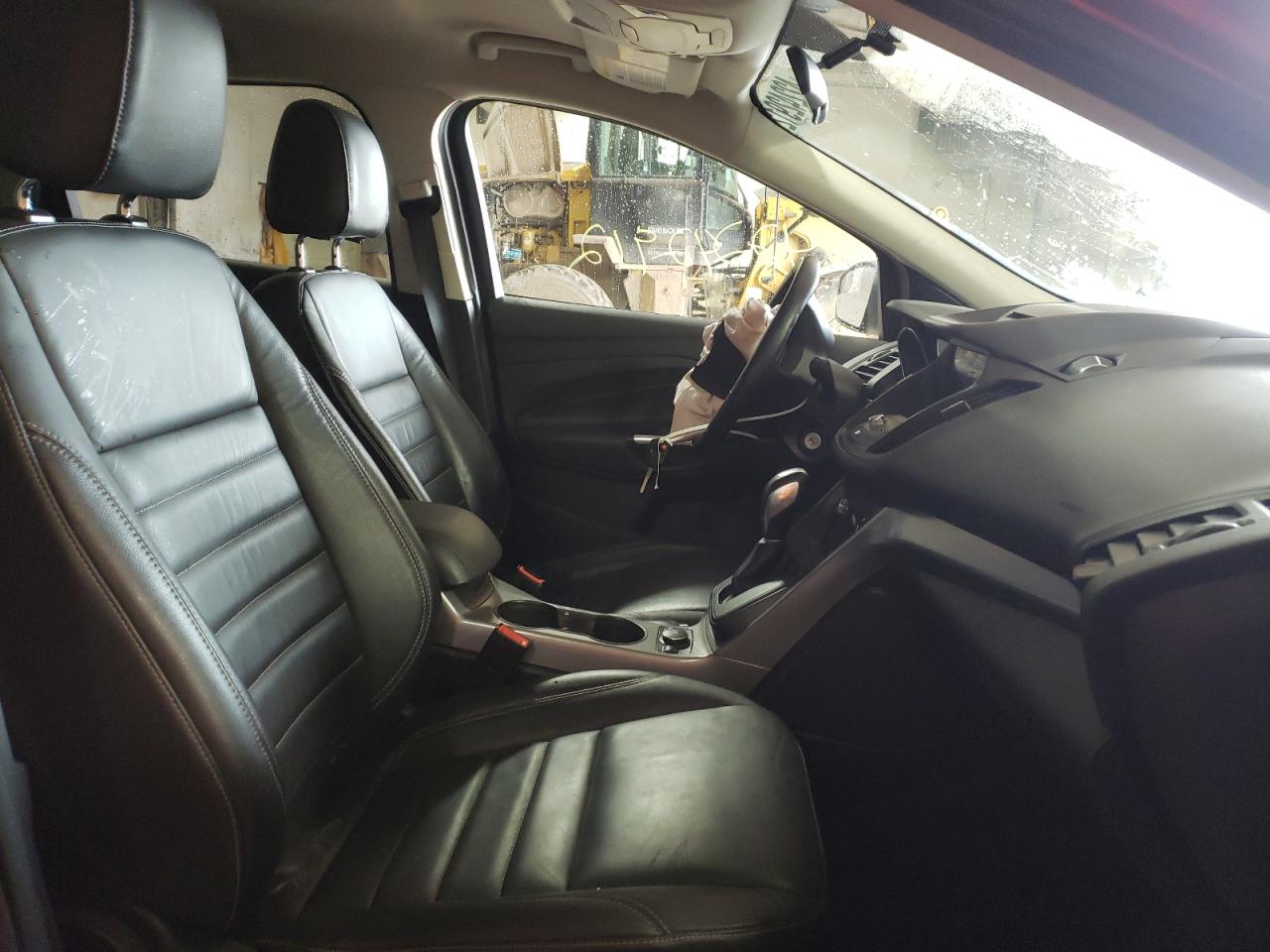 Photo 5 from auction – 2016 FORD ESCAPE SE with VIN 1FMCU9GX3GUC24693
