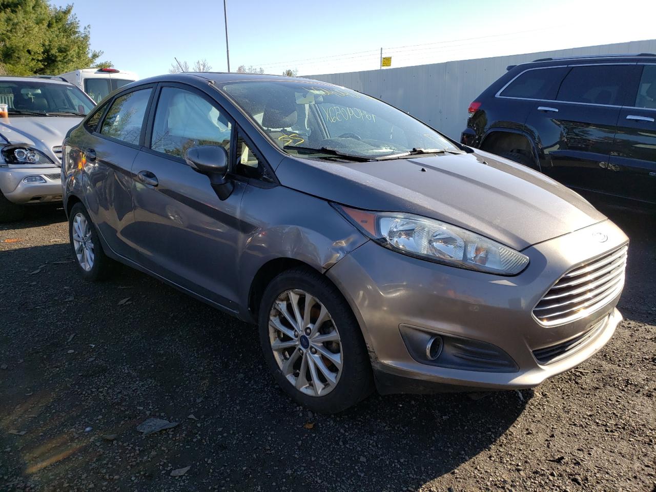 FORD FIESTA SE 2014 with VIN 3FADP4BJ3EM153377 - Photo from auction