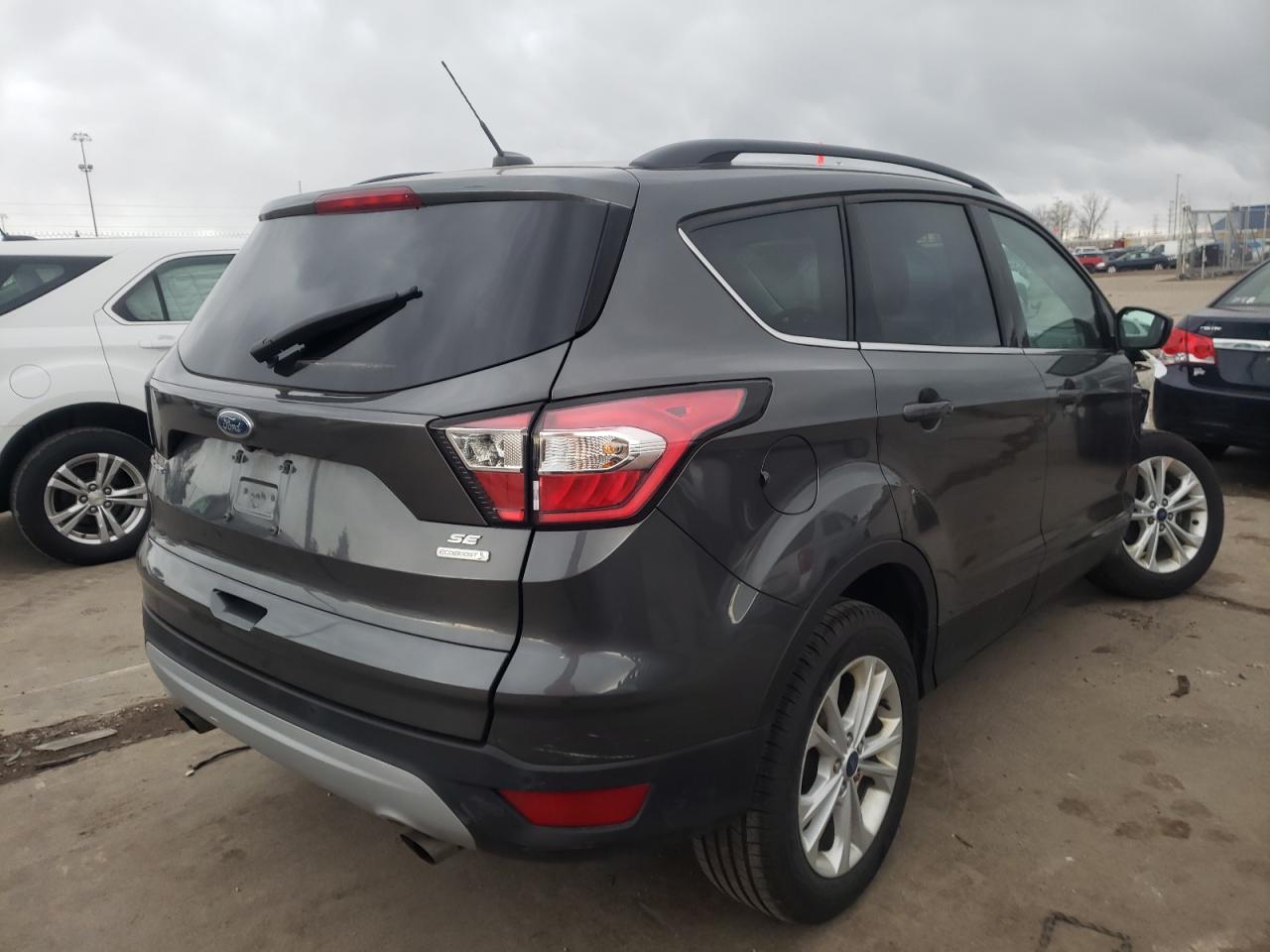 Photo 4 from auction – 2017 FORD ESCAPE SE with VIN 1FMCU0GD0HUE92524