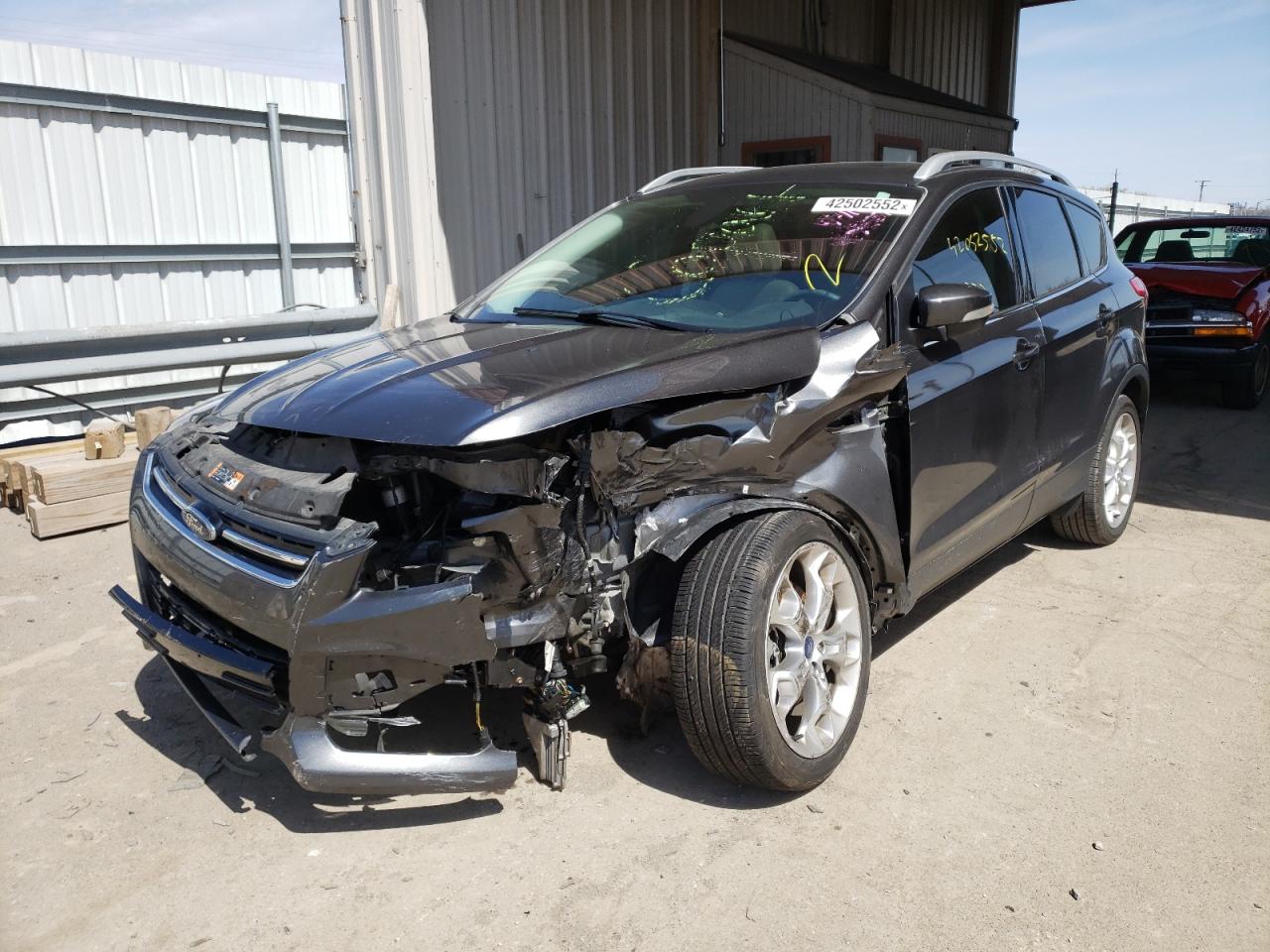 Photo 2 from auction – 2015 FORD ESCAPE TIT with VIN 1FMCU0J96FUB43126