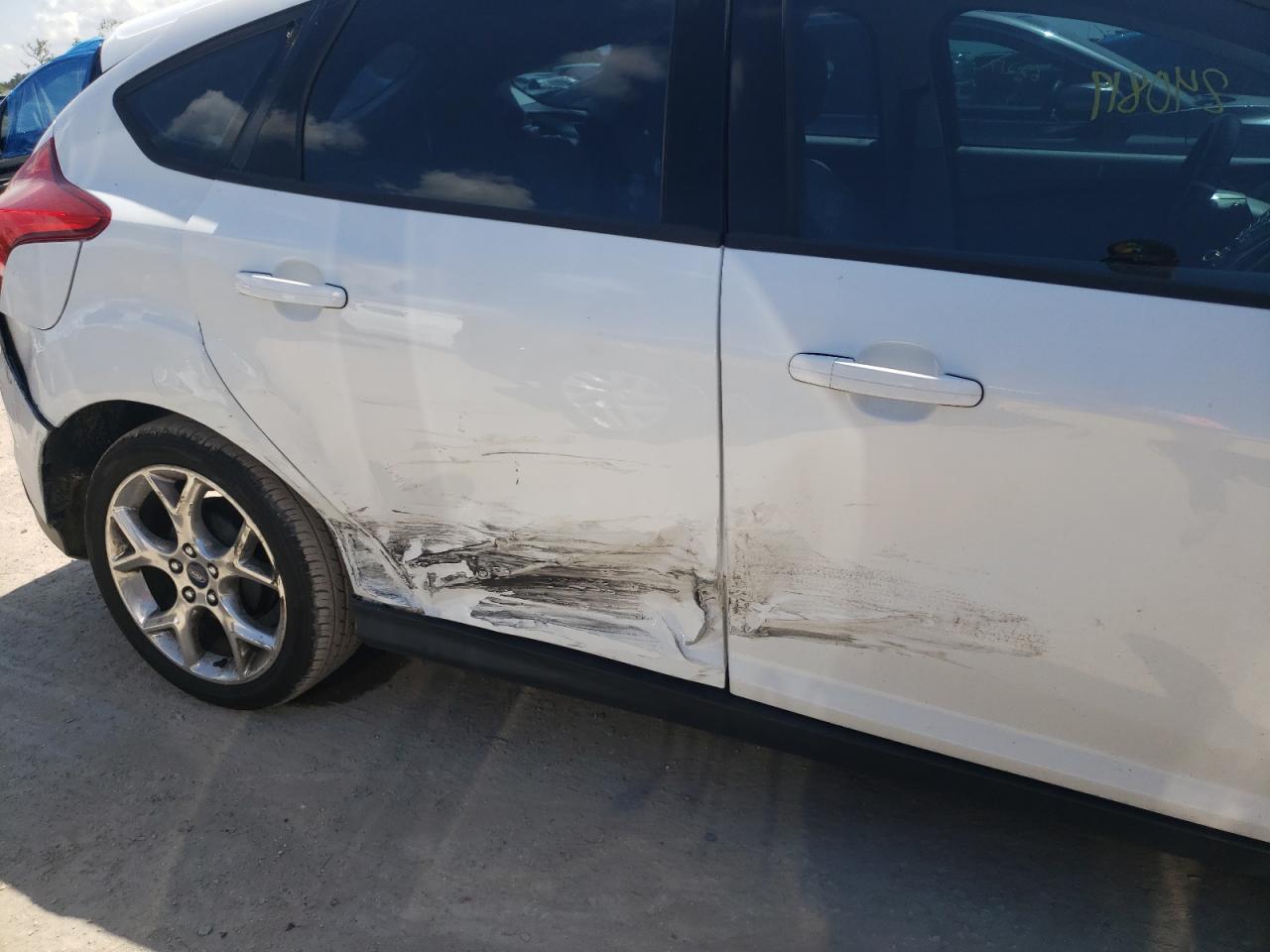 Photo 9 from auction – 2012 FORD FOCUS SE with VIN 1FAHP3K25CL302987
