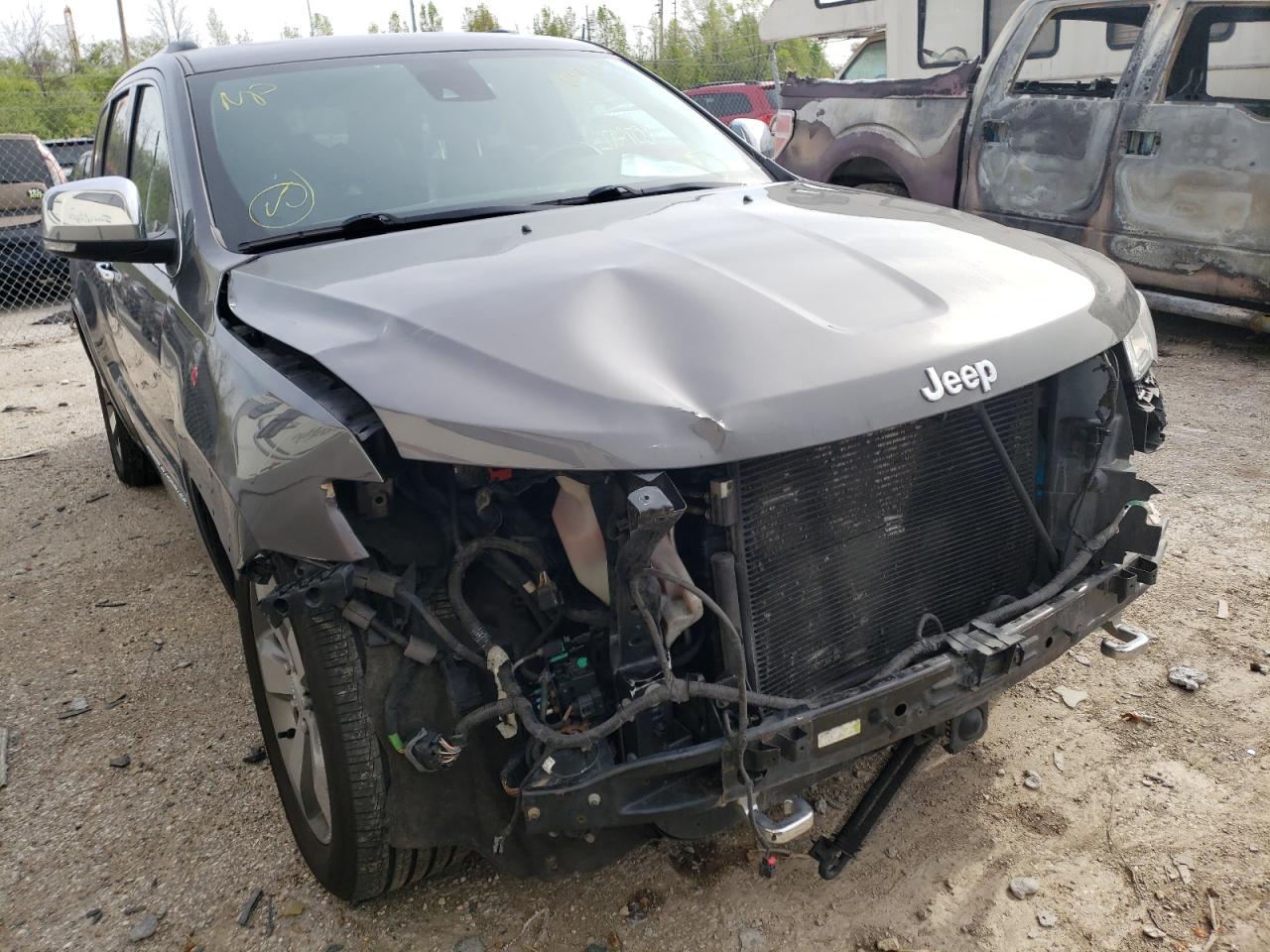 JEEP GRAND CHER 2014 with VIN 1C4RJFCT2EC379831 - Photo from auction