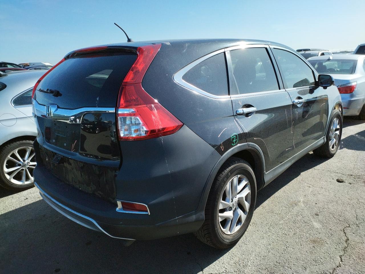 Photo 4 from auction – 2015 HONDA CR-V EX with VIN 3CZRM3H53FG705676