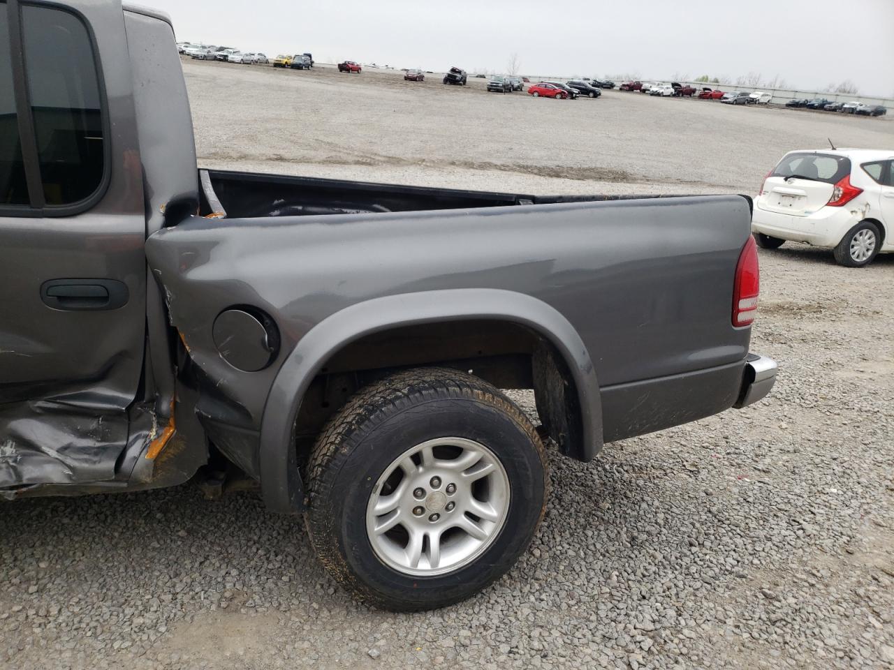 Photo 10 from auction – 2002 DODGE DAKOTA QUA with VIN 1B7HL48X52S561160