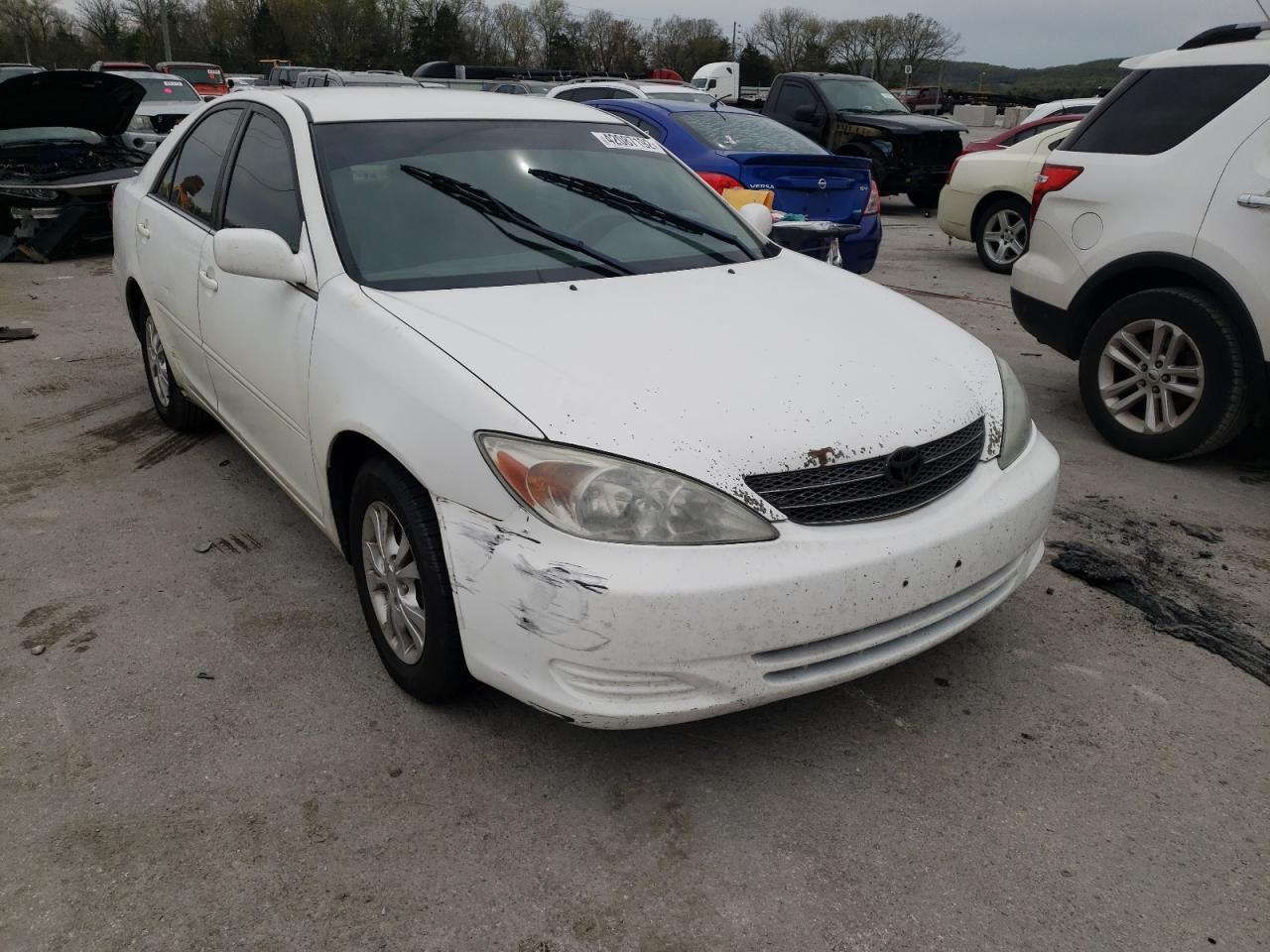 TOYOTA CAMRY LE 2004 with VIN 4T1BF30K34U074257 - Photo from auction