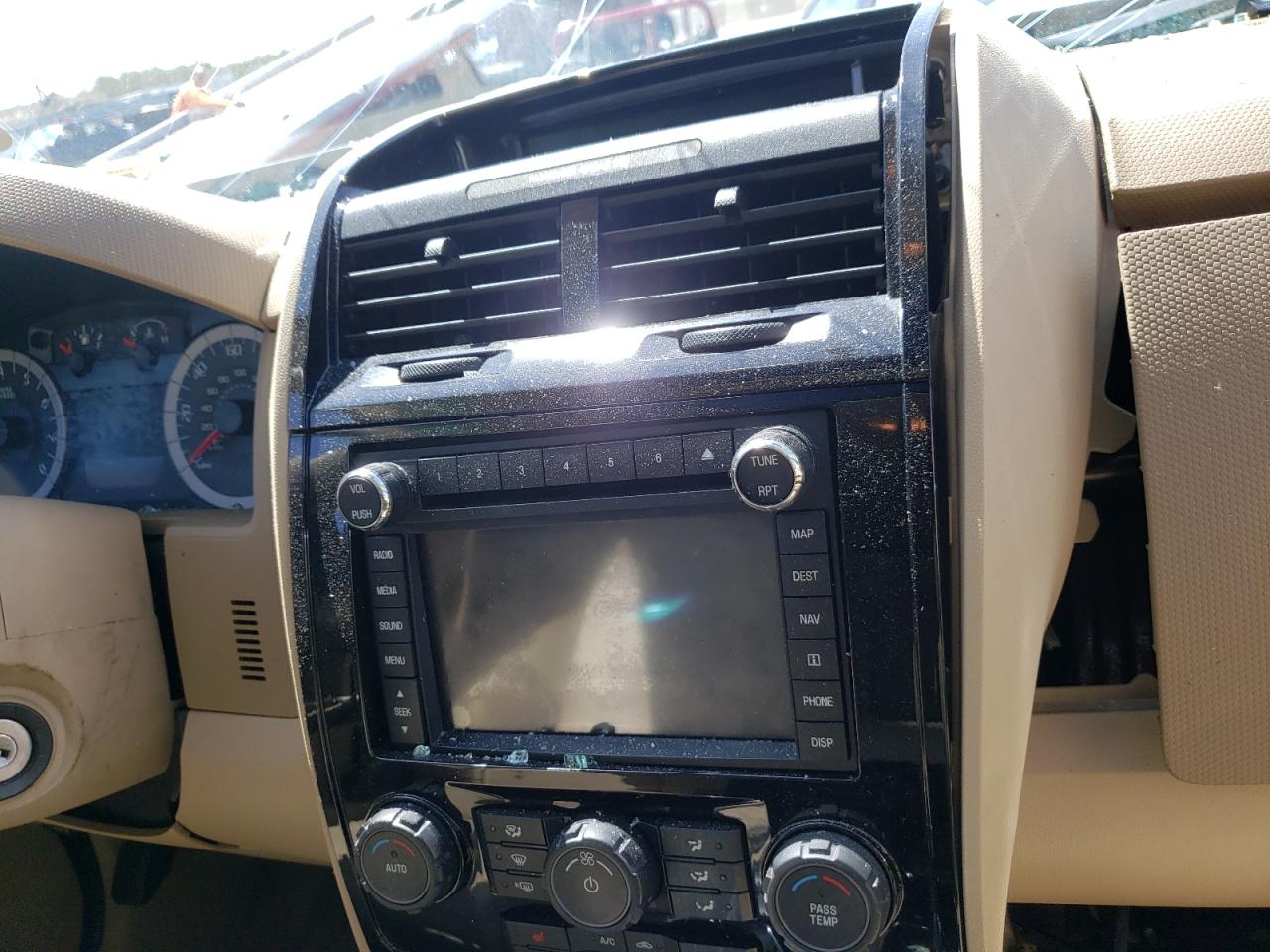 Photo 9 from auction – 2011 FORD ESCAPE LIM with VIN 1FMCU9EG6BKA60220