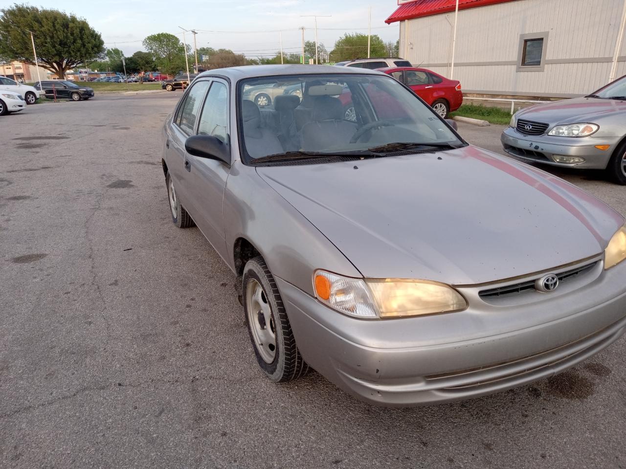 TOYOTA COROLLA VE 2000 with VIN 1NXBR12E9YZ356931 - Photo from auction
