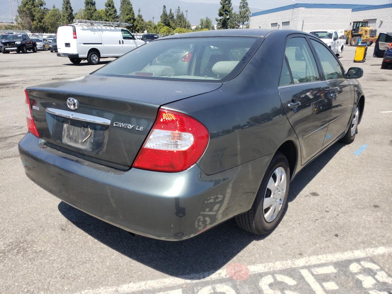 Photo 4 from auction – 2002 TOYOTA CAMRY LE with VIN JTDBE32K220114904