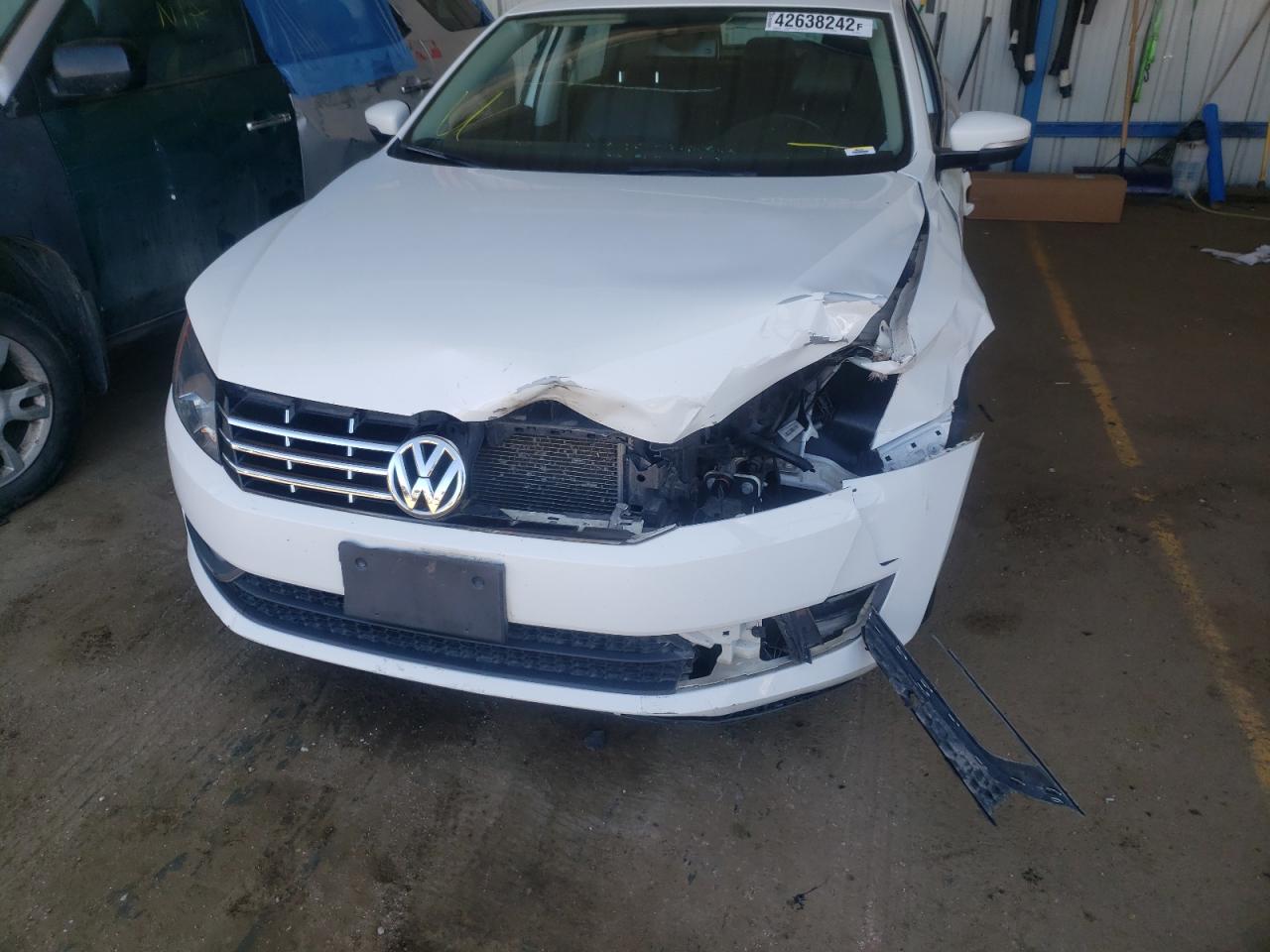 Photo 9 from auction – 2014 VOLKSWAGEN PASSAT SE with VIN 1VWBN7A31EC093447