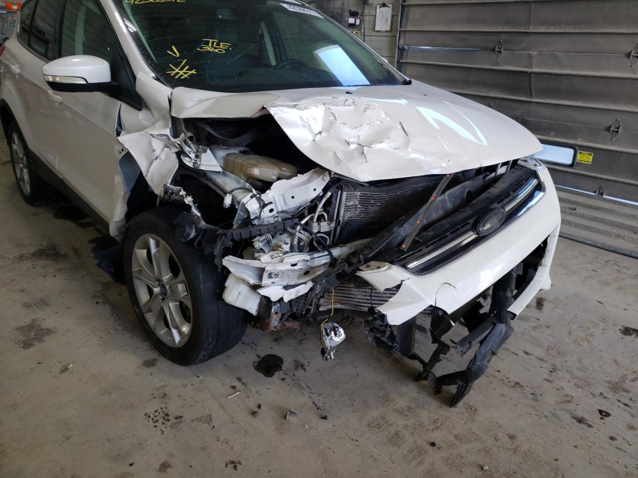 Photo 9 from auction – 2013 FORD ESCAPE SEL with VIN 1FMCU9H97DUB09378