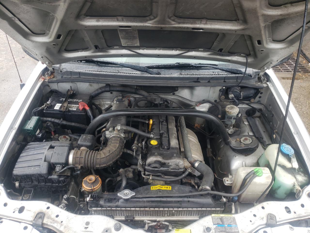 Photo 7 from auction – 2002 CHEVROLET TRACKER with VIN 2CNBJ13C626933957