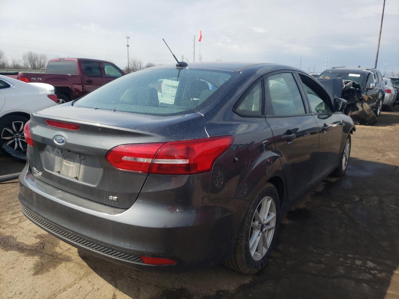 Photo 4 from auction – 2018 FORD FOCUS SE with VIN 1FADP3F2XJL229010