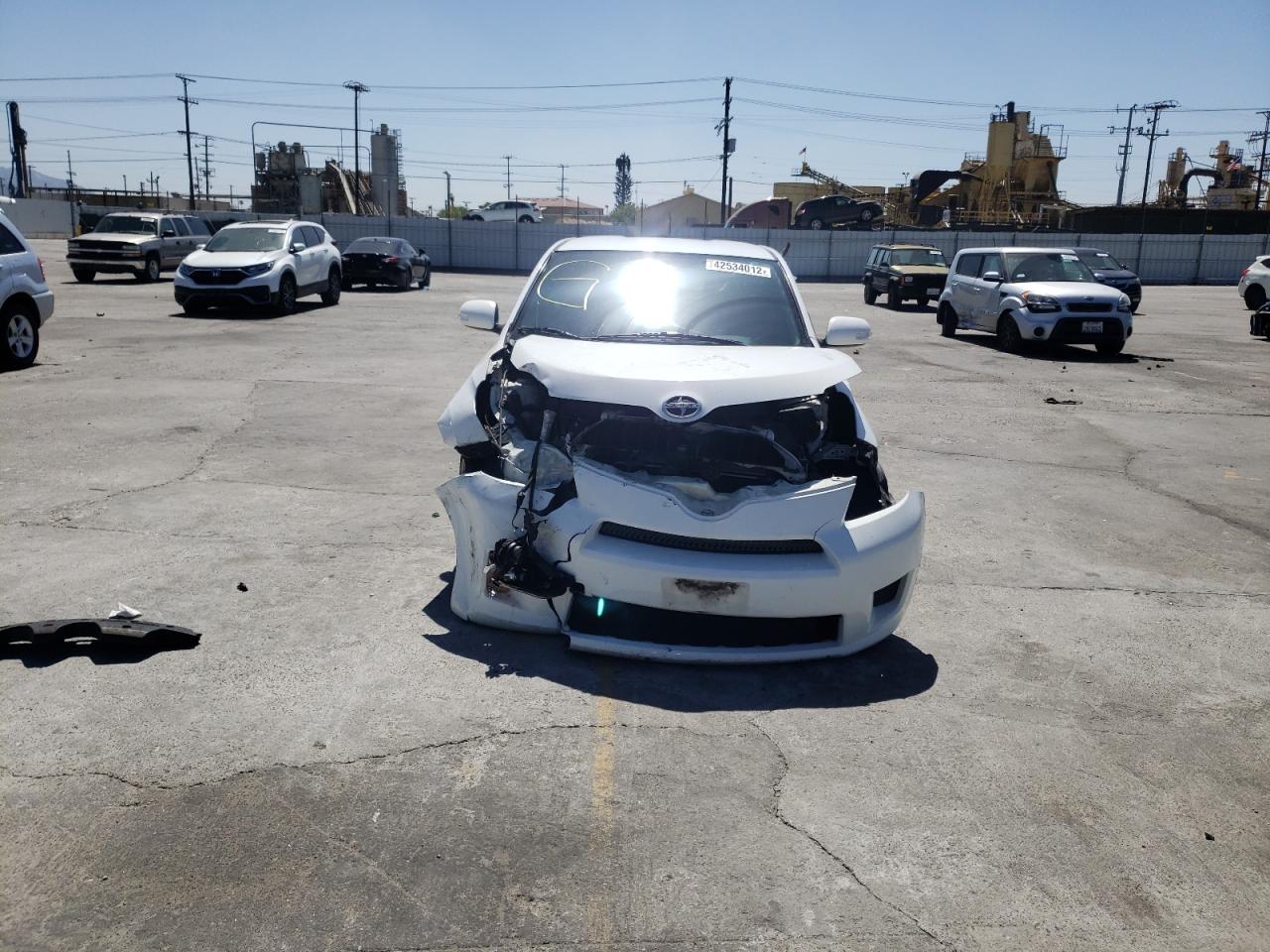 Photo 9 from auction – 2010 TOYOTA SCION XD with VIN JTKKU4B41AJ054383