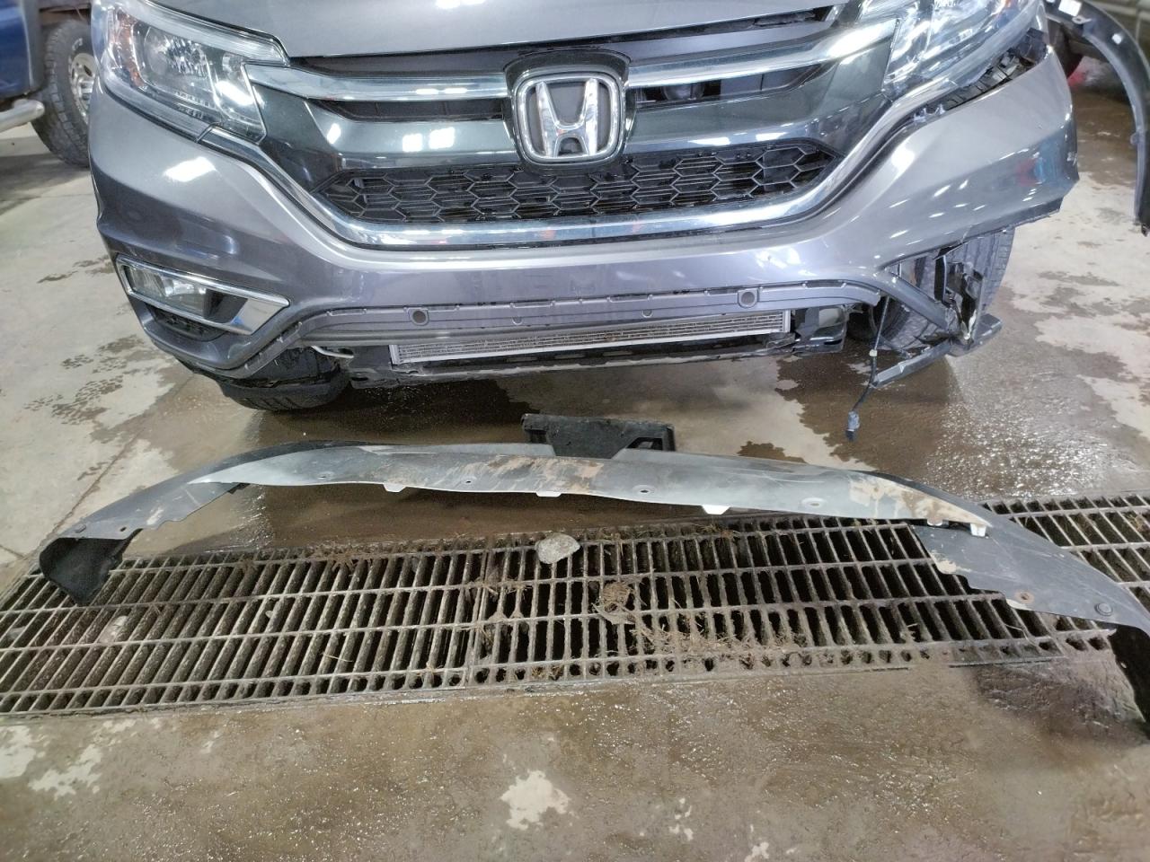 Photo 9 from auction – 2015 HONDA CR-V EX with VIN 5J6RM4H59FL118682