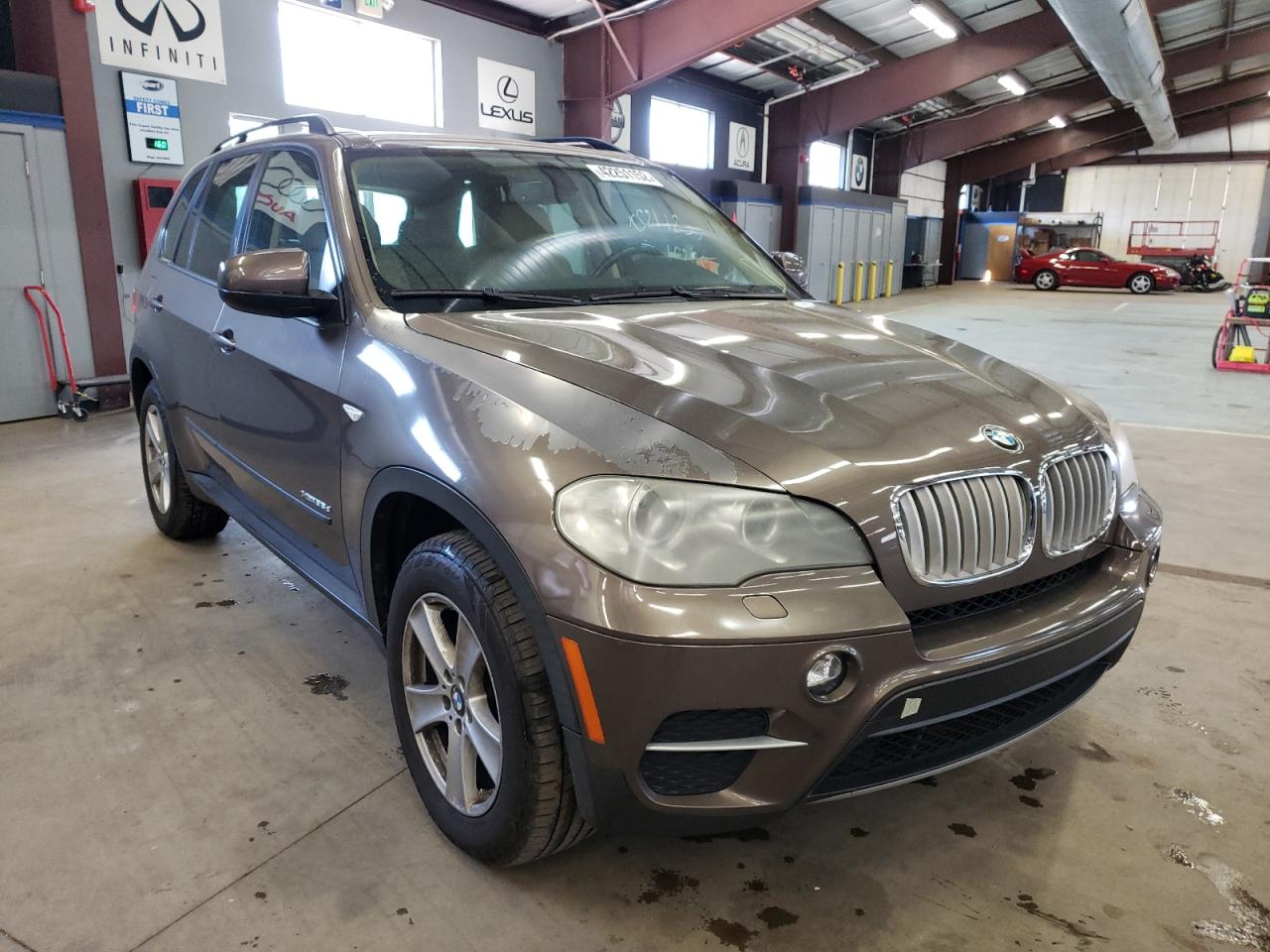 BMW X5 XDRIVE3 2011 with VIN 5UXZW0C50BL662416 - Photo from auction