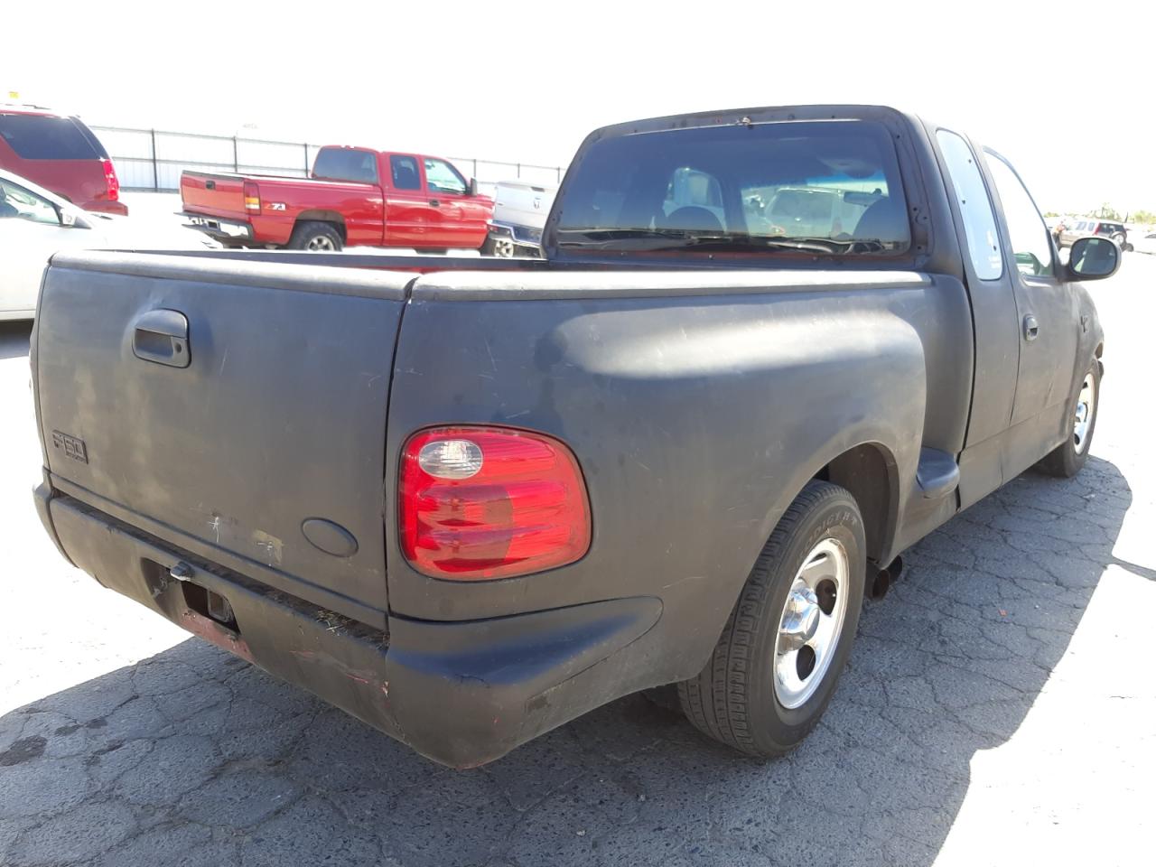 Photo 4 from auction – 2001 FORD F150 with VIN 1FTRX07L11KE47963