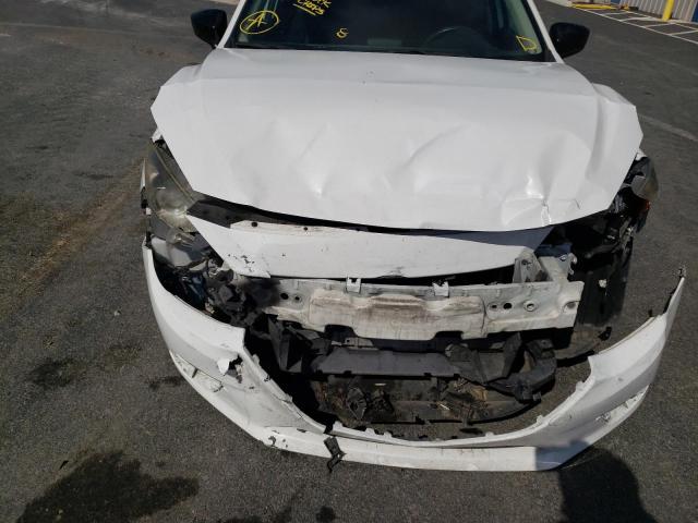 Photo 9 from auction – 2014 MAZDA 3 SV with VIN JM1BM1T72E1208846