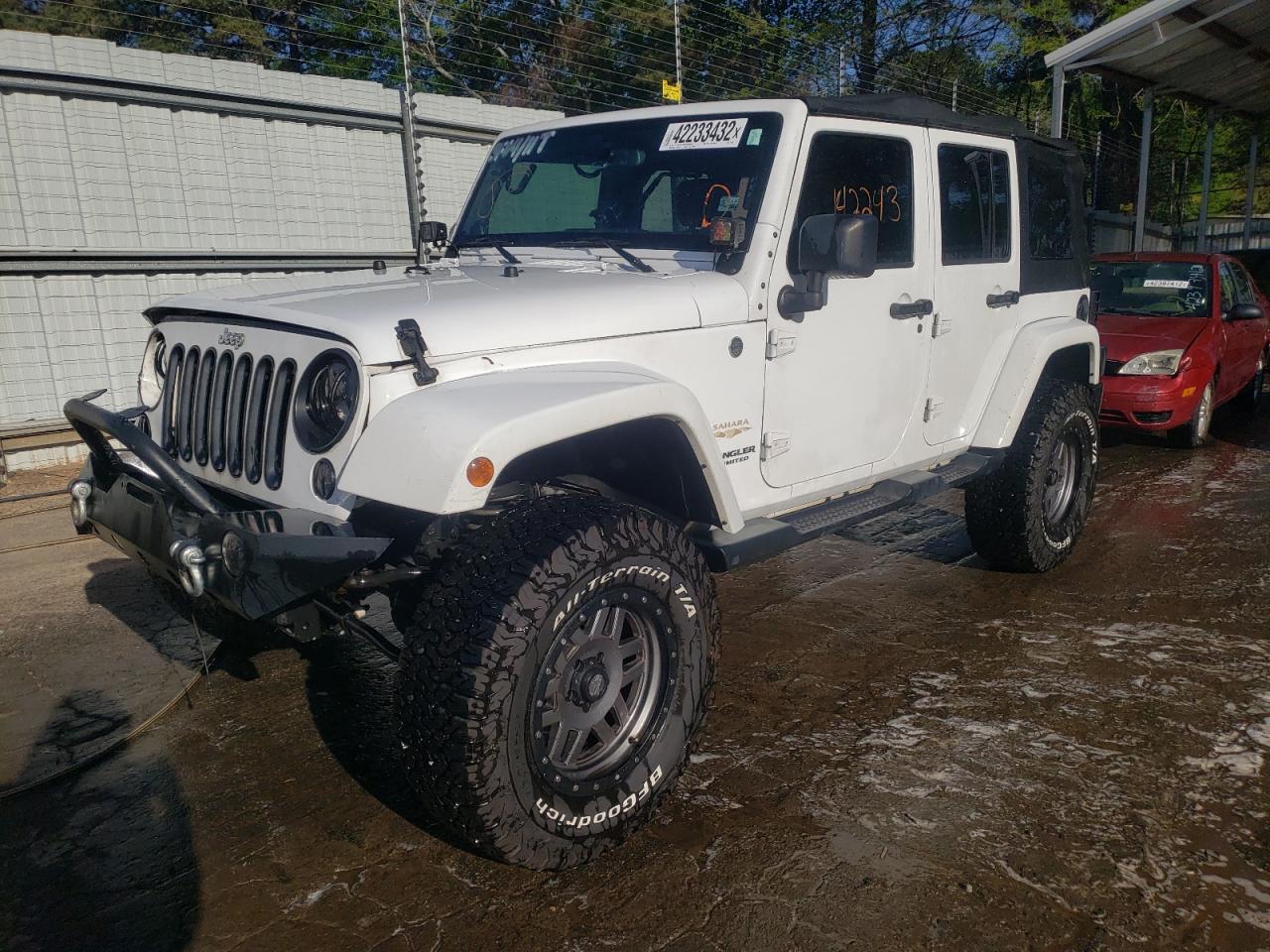 Photo 2 from auction – 2014 JEEP WRANGLER U with VIN 1C4BJWEG3EL174925
