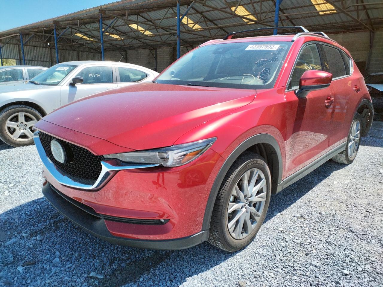 Photo 2 from auction – 2021 MAZDA CX-5 GRAND with VIN JM3KFBDM1M1448660