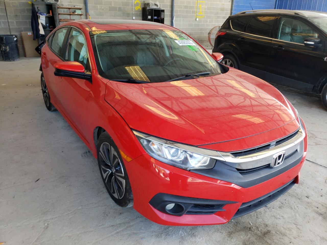 HONDA CIVIC EXL 2016 with VIN 2HGFC1F75GH650929 - Photo from auction