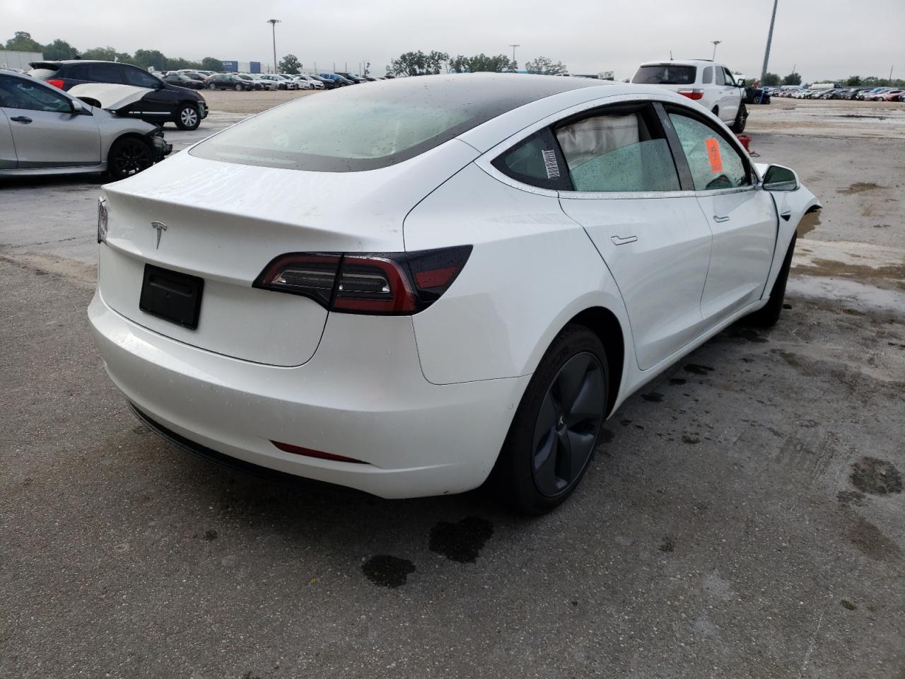 Photo 4 from auction – 2020 TESLA MODEL 3 with VIN 5YJ3E1EA1LF599213
