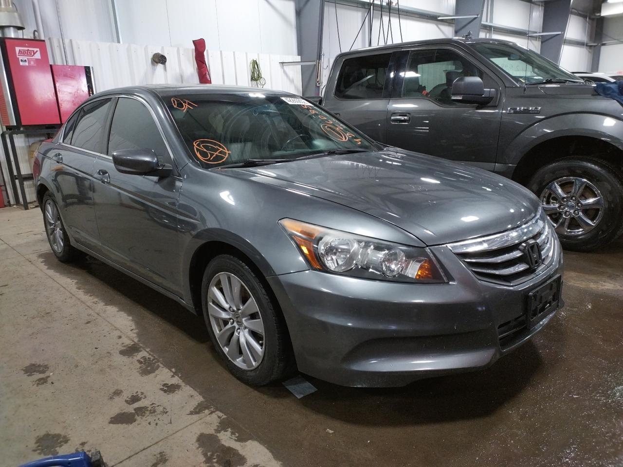 HONDA ACCORD EXL 2012 with VIN 1HGCP2F89CA057394 - Photo from auction