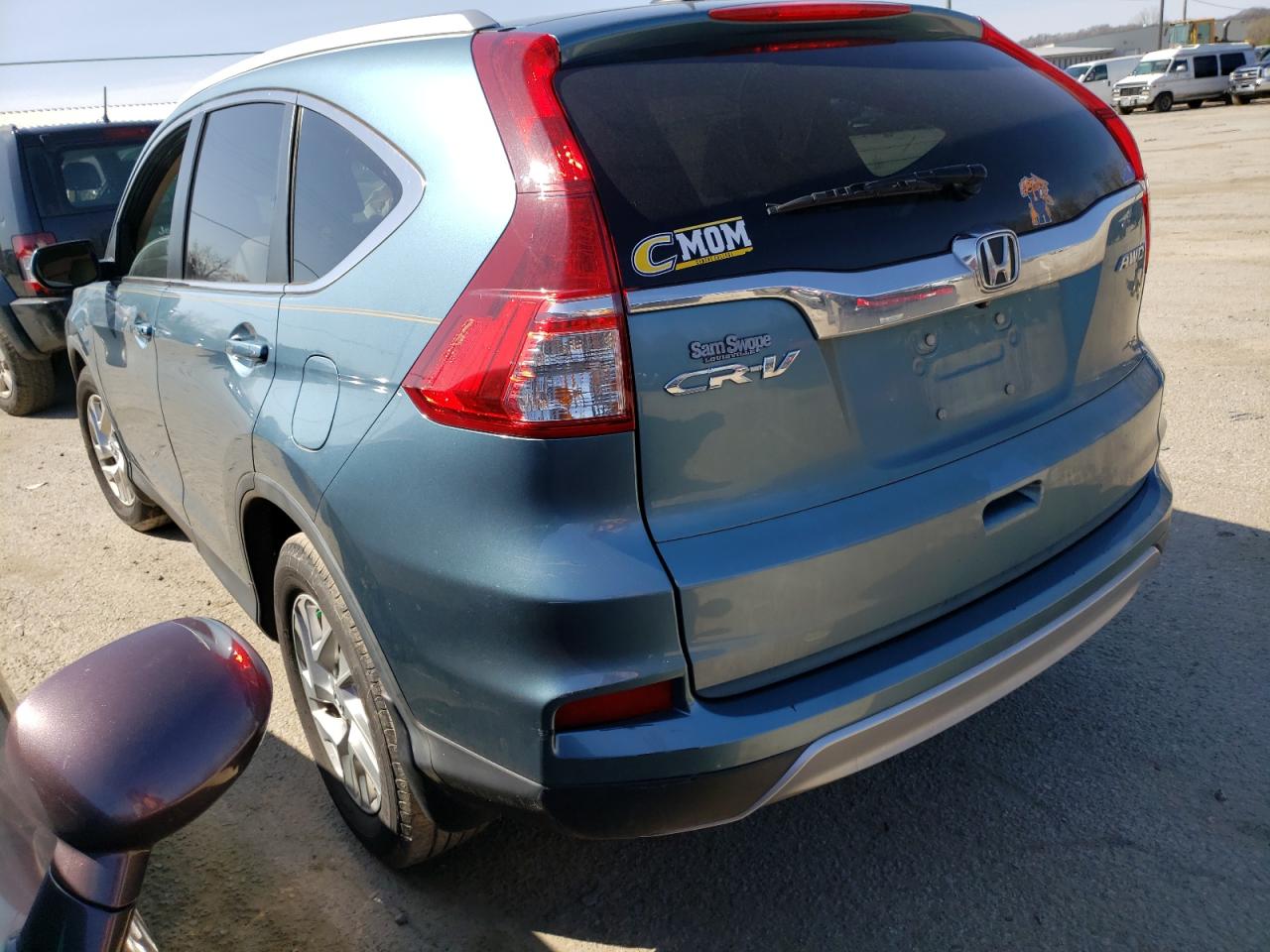 Photo 3 from auction – 2015 HONDA CR-V EXL with VIN 5J6RM4H79FL020589