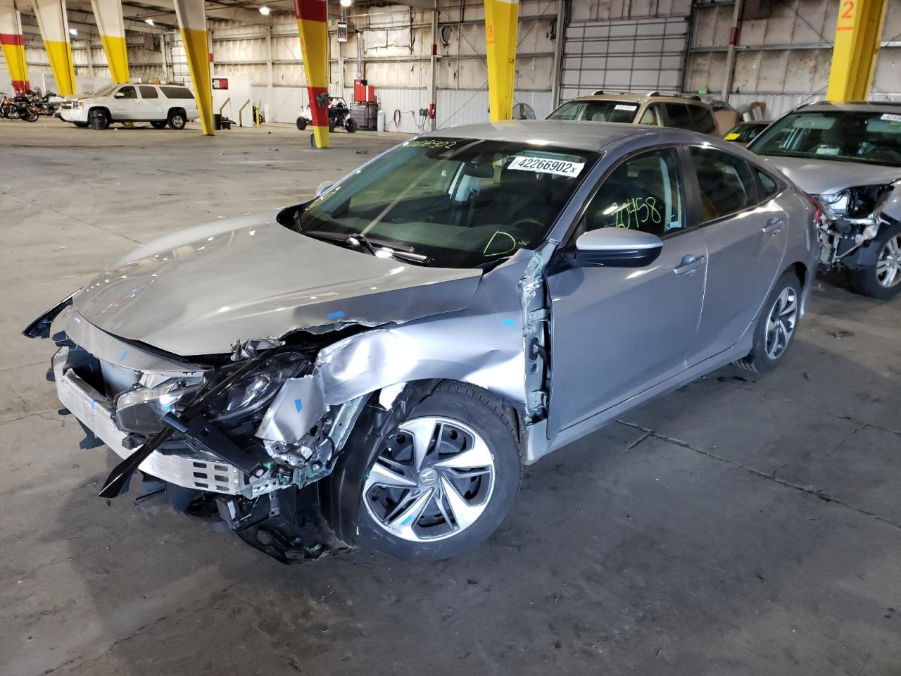 Photo 2 from auction – 2019 HONDA CIVIC LX with VIN 19XFC2F65KE209706