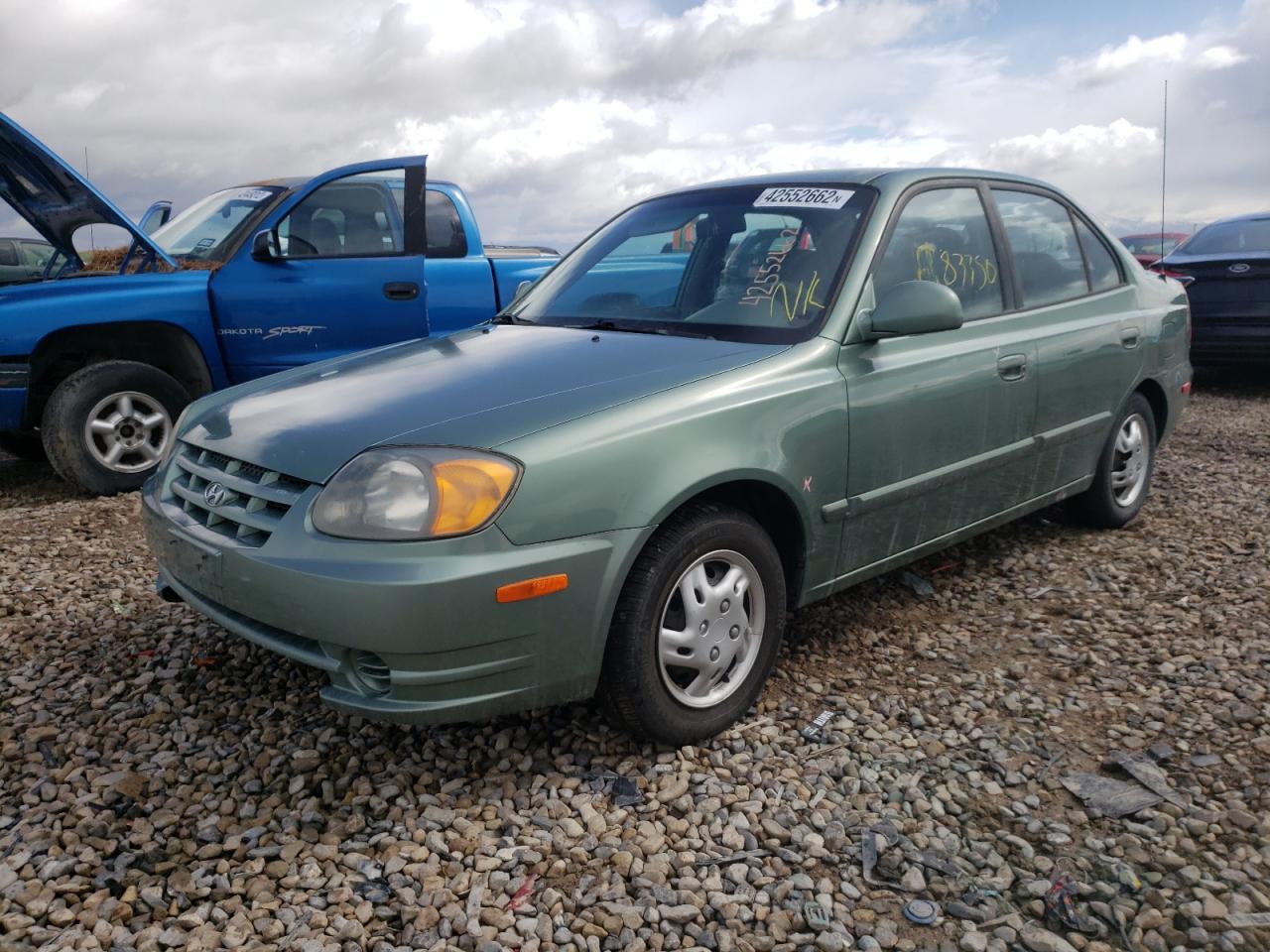 Photo 2 from auction – 2005 HYUNDAI ACCENT GL with VIN KMHCG45C55U613133