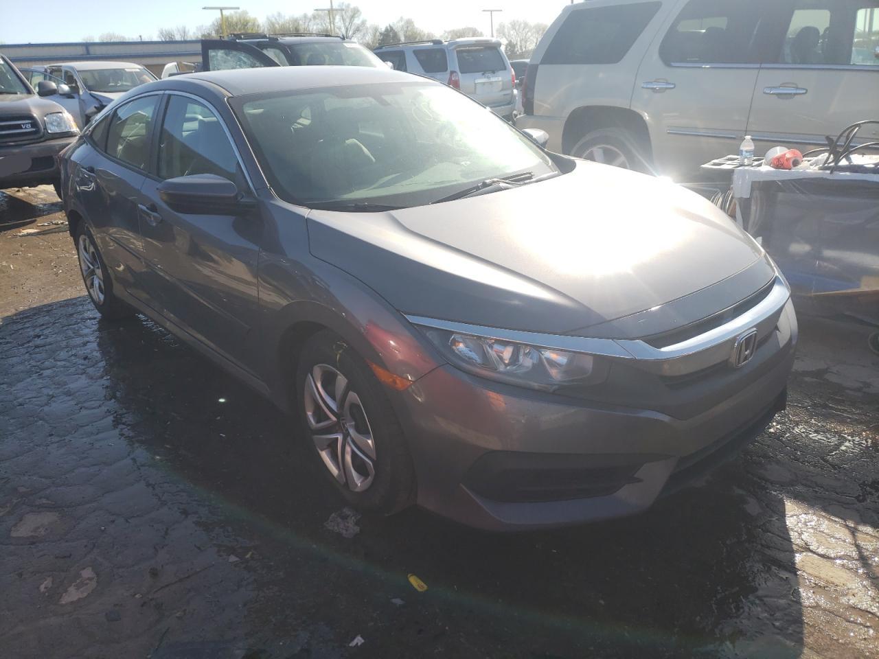 HONDA CIVIC LX 2018 with VIN 19XFC2F53JE006917 - Photo from auction