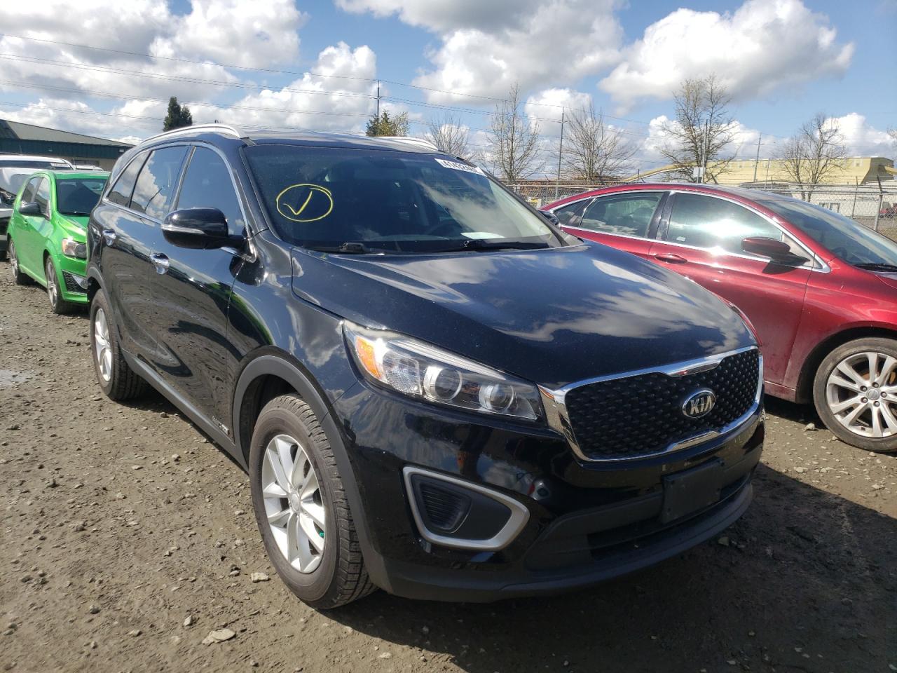 KIA SORENTO LX 2016 with VIN 5XYPGDA54GG029484 - Photo from auction
