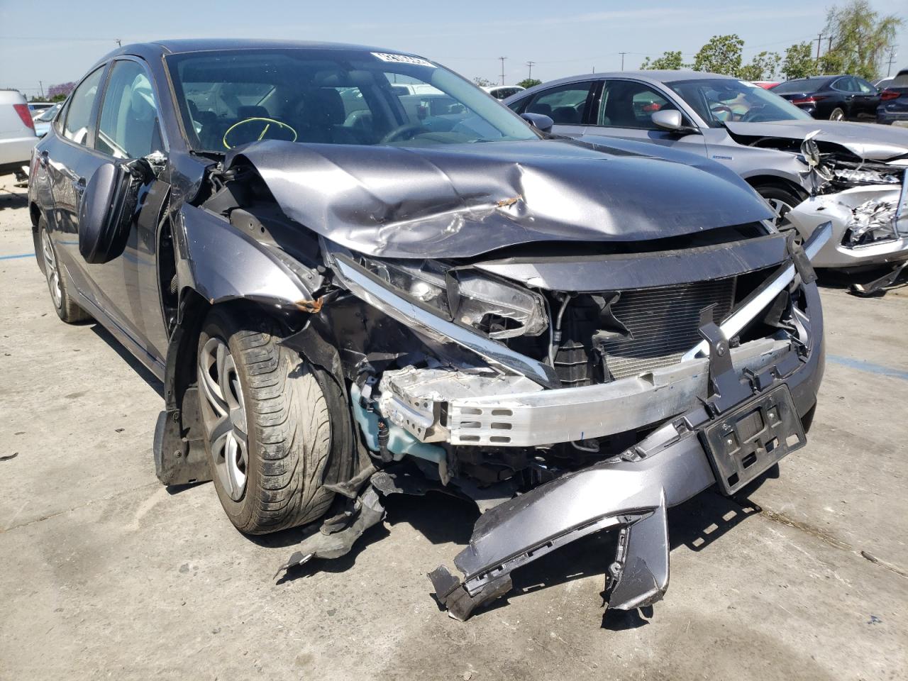 HONDA CIVIC LX 2018 with VIN 2HGFC2F52JH576204 - Photo from auction