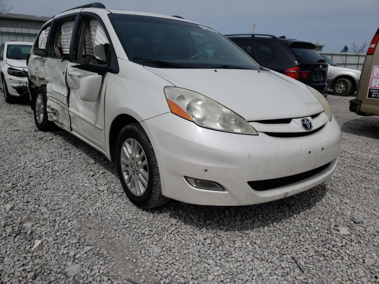TOYOTA SIENNA XLE 2010 with VIN 5TDYK4CC3AS323239 - Photo from auction