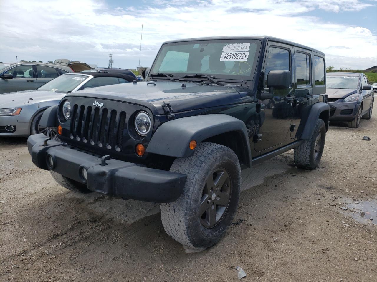 Photo 2 from auction – 2011 JEEP WRANGLER U with VIN 1J4BA6H12BL565450