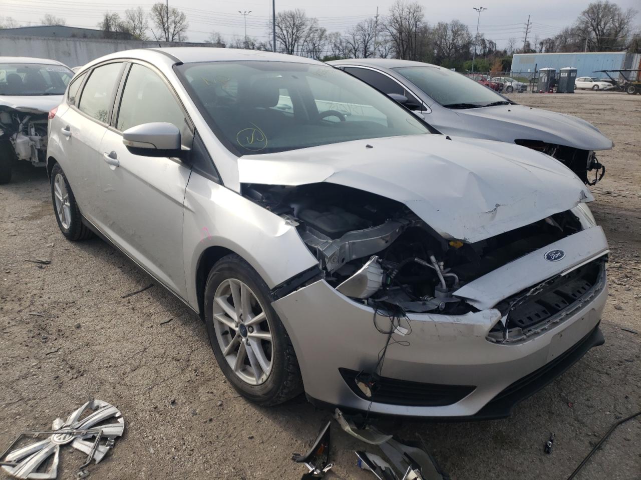 FORD FOCUS SE 2015 with VIN 1FADP3K20FL223441 - Photo from auction
