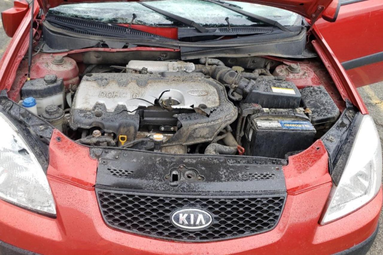 Photo 7 from auction – 2006 KIA RIO with VIN KNADE123766109087