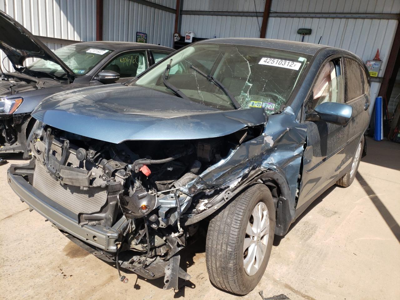 Photo 2 from auction – 2014 HONDA CR-V EX with VIN 5J6RM4H56EL045608