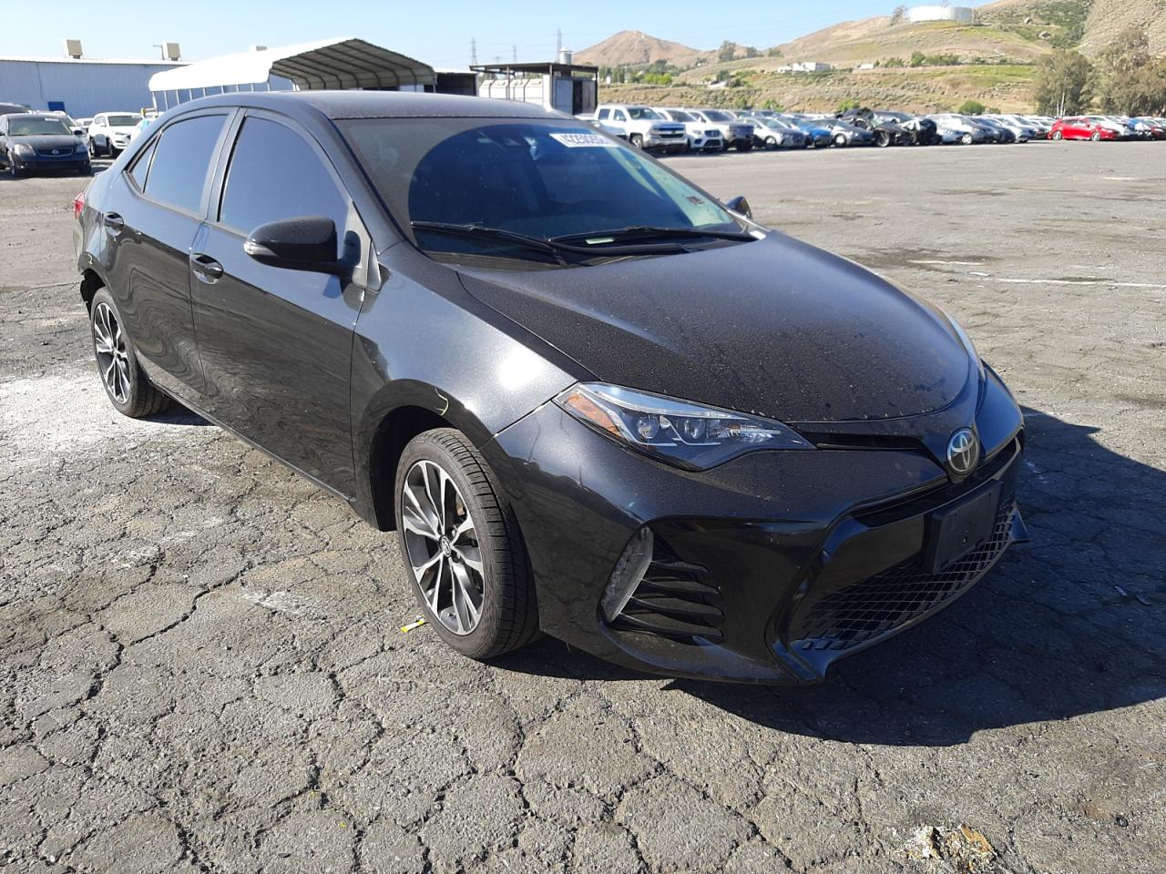 TOYOTA COROLLA 2018 with VIN 5YFBURHE3JP845935 - Photo from auction